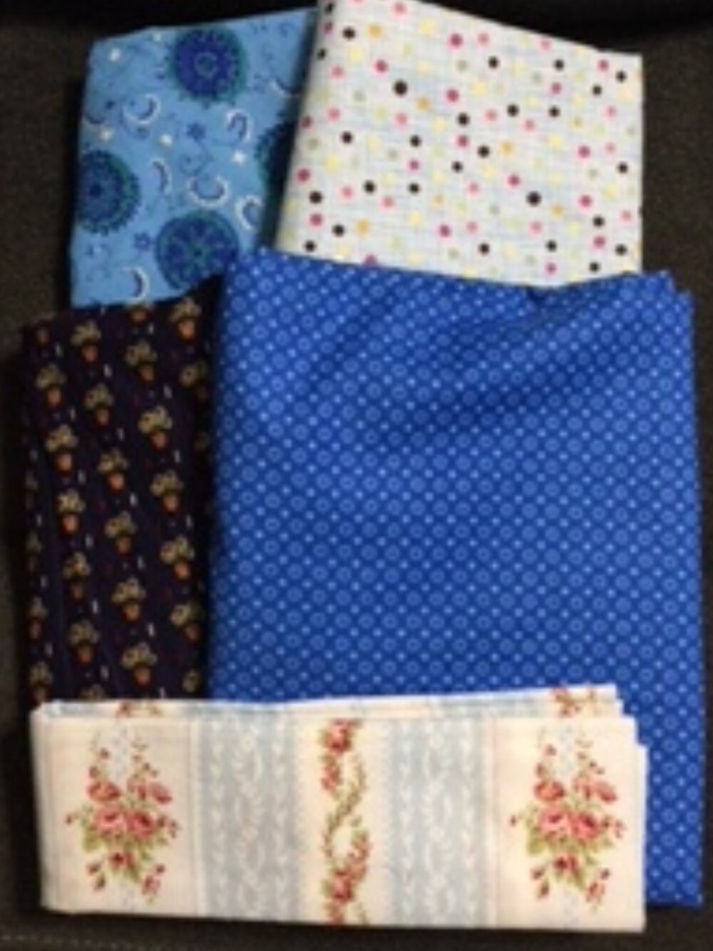 8 1/2 yards of blue fabric